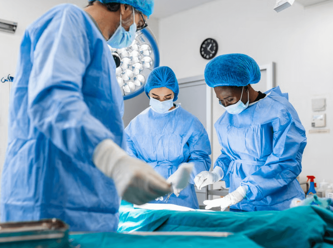 Surgical team performing a liver operation in a modern operating theatre